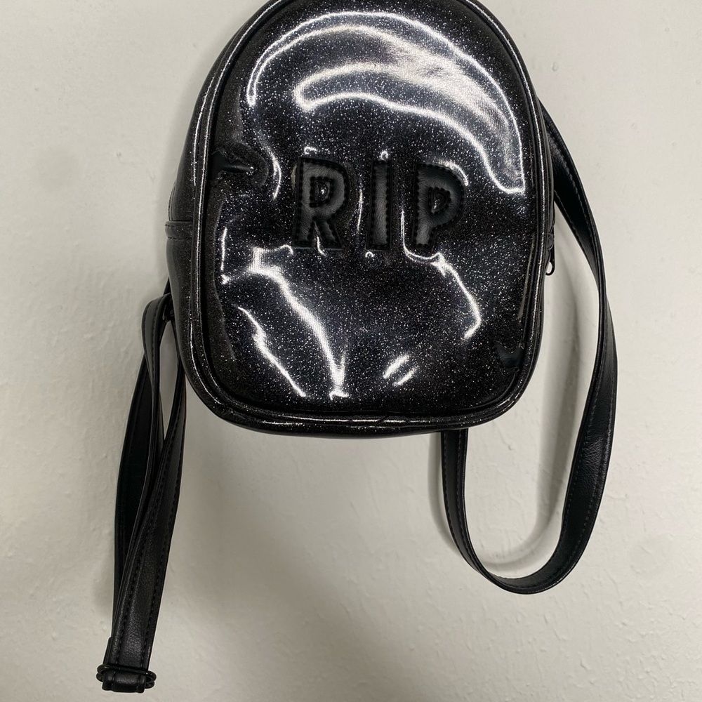 Love pain and stitches backpack